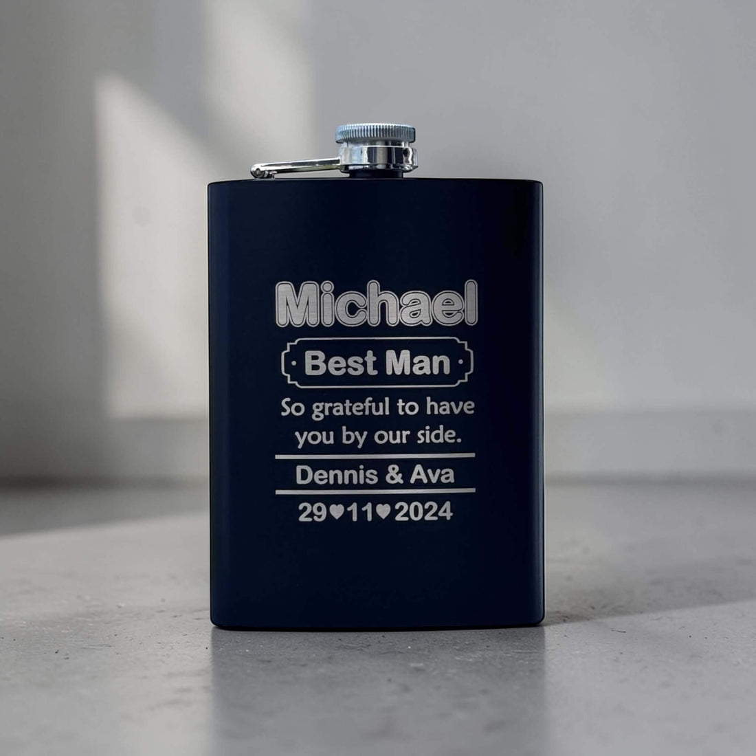 Black hip flask engraved with a name, Best Man role, personal message and wedding date, a personalised groomsmen gift for a NZ wedding