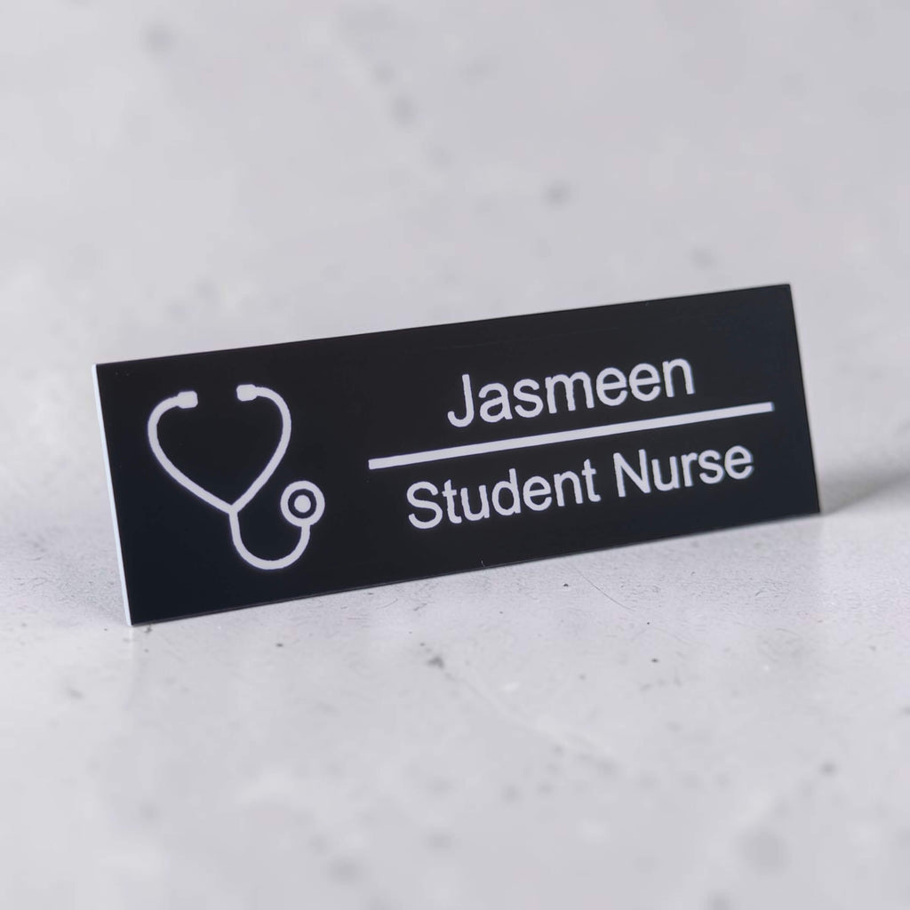 Angled personalised name badge with stethoscope icon and engraved role text