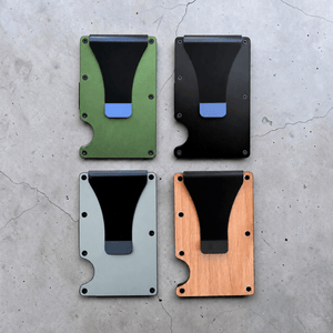 Back view of four slim card holders with money clips in green, black, light blue and wood finish