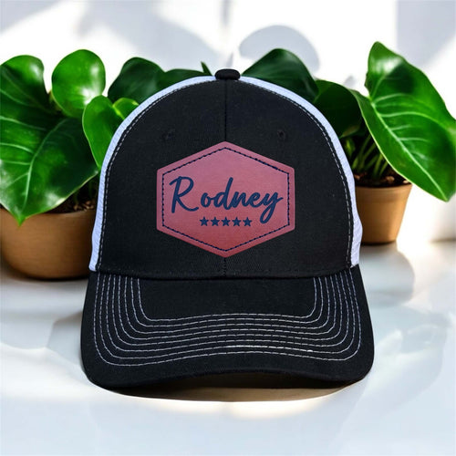 Black and white cap with engraved patch