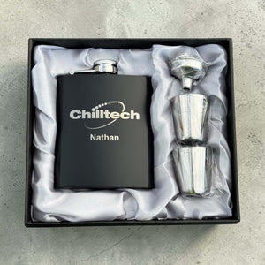 Branded black hip flask with engraved company logo and name in gift box with shot glasses and funnel, corporate gift set
