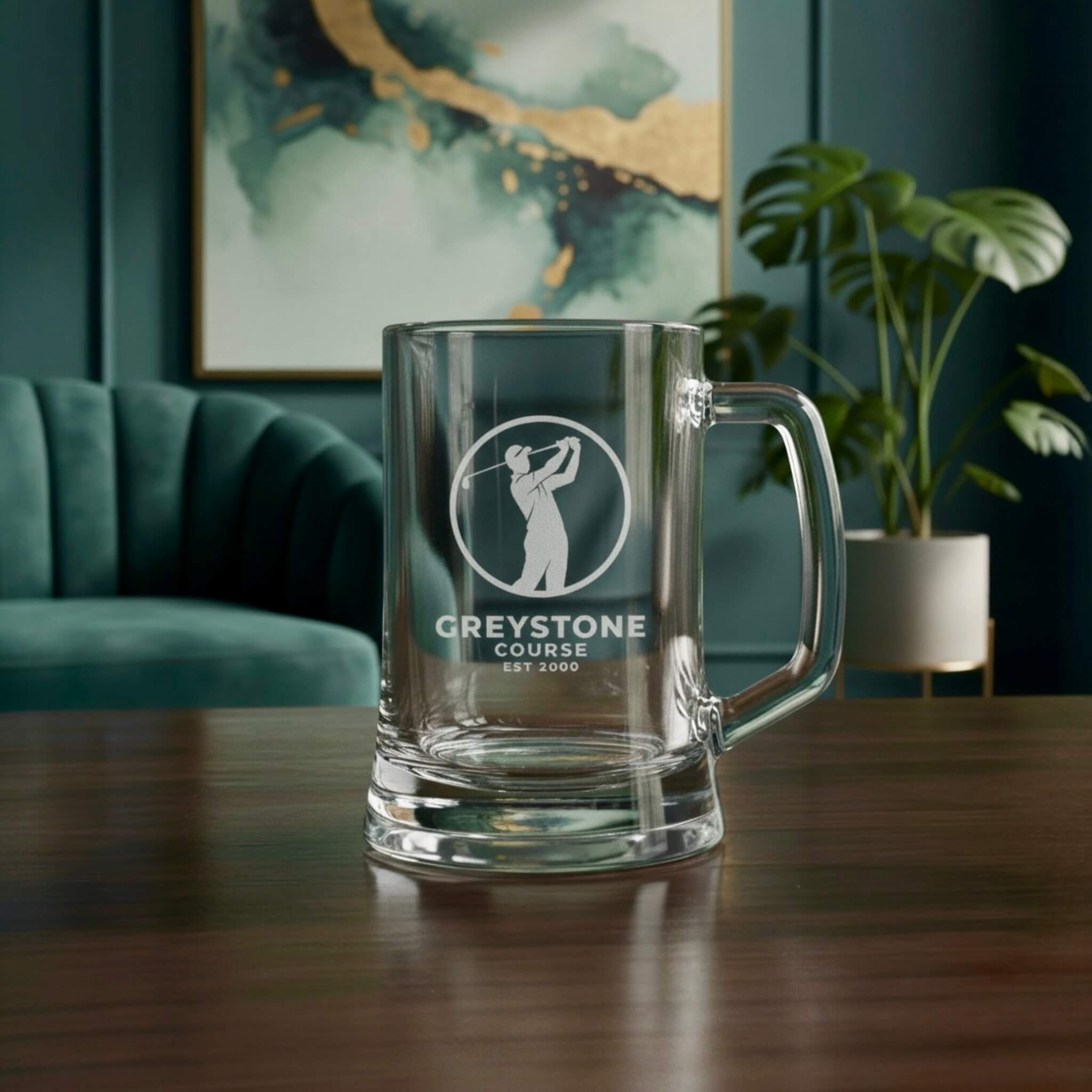 Business award engraved beer mug featuring logo design, displayed in an office setting.