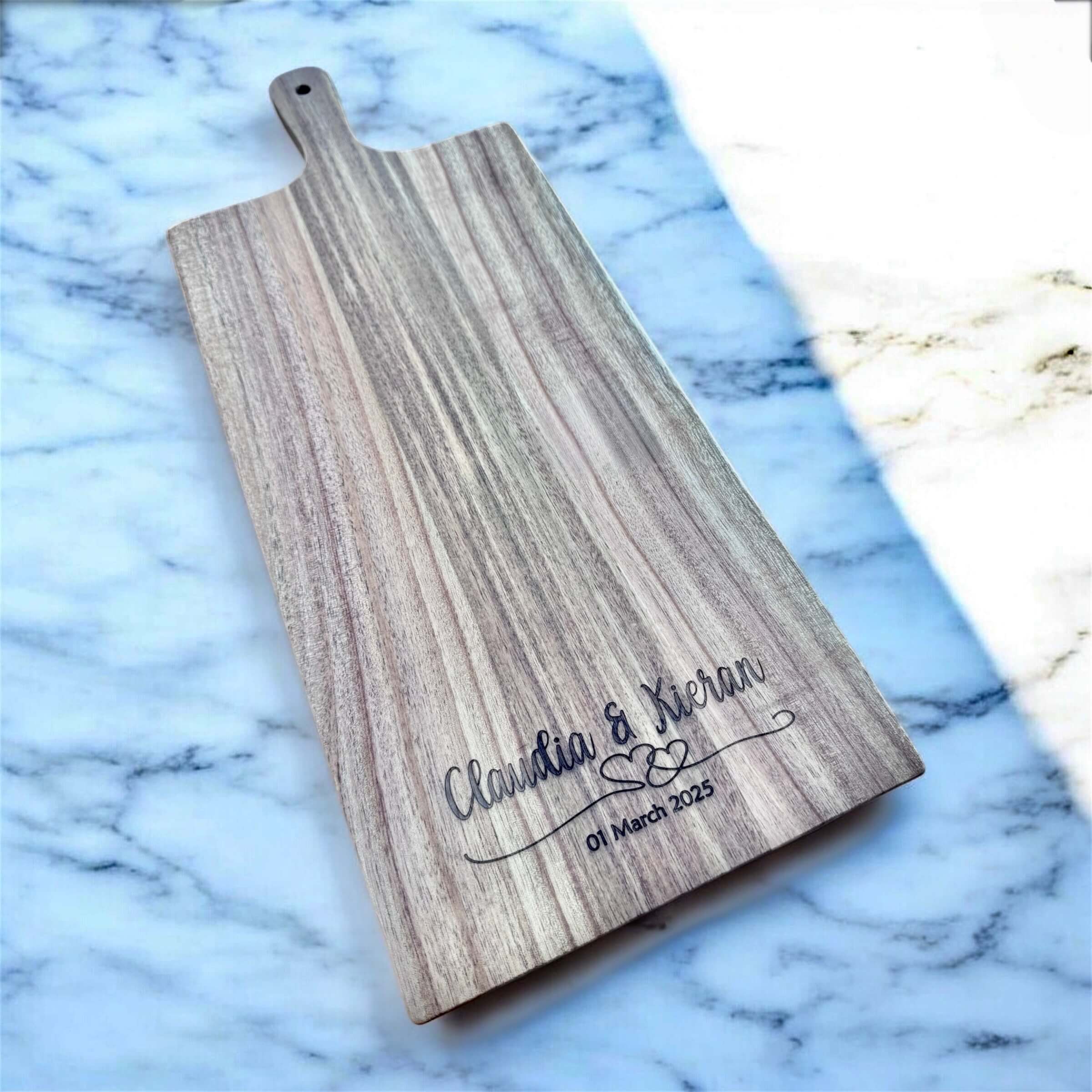 Close-up of custom engraving on Acacia wood serving board