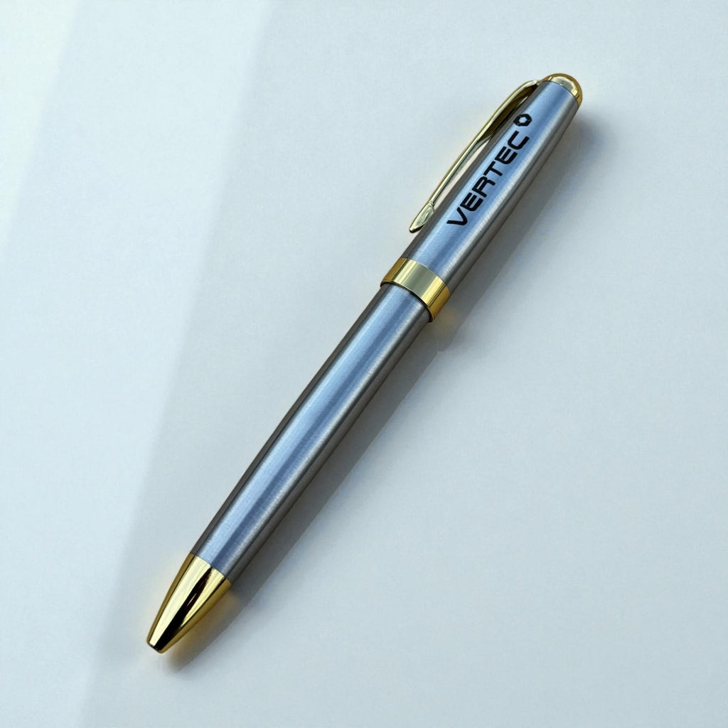 Close-up of engraved metal business pen showing custom logo detail