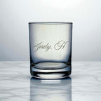 Close-up of engraved name detail on custom whiskey glass
