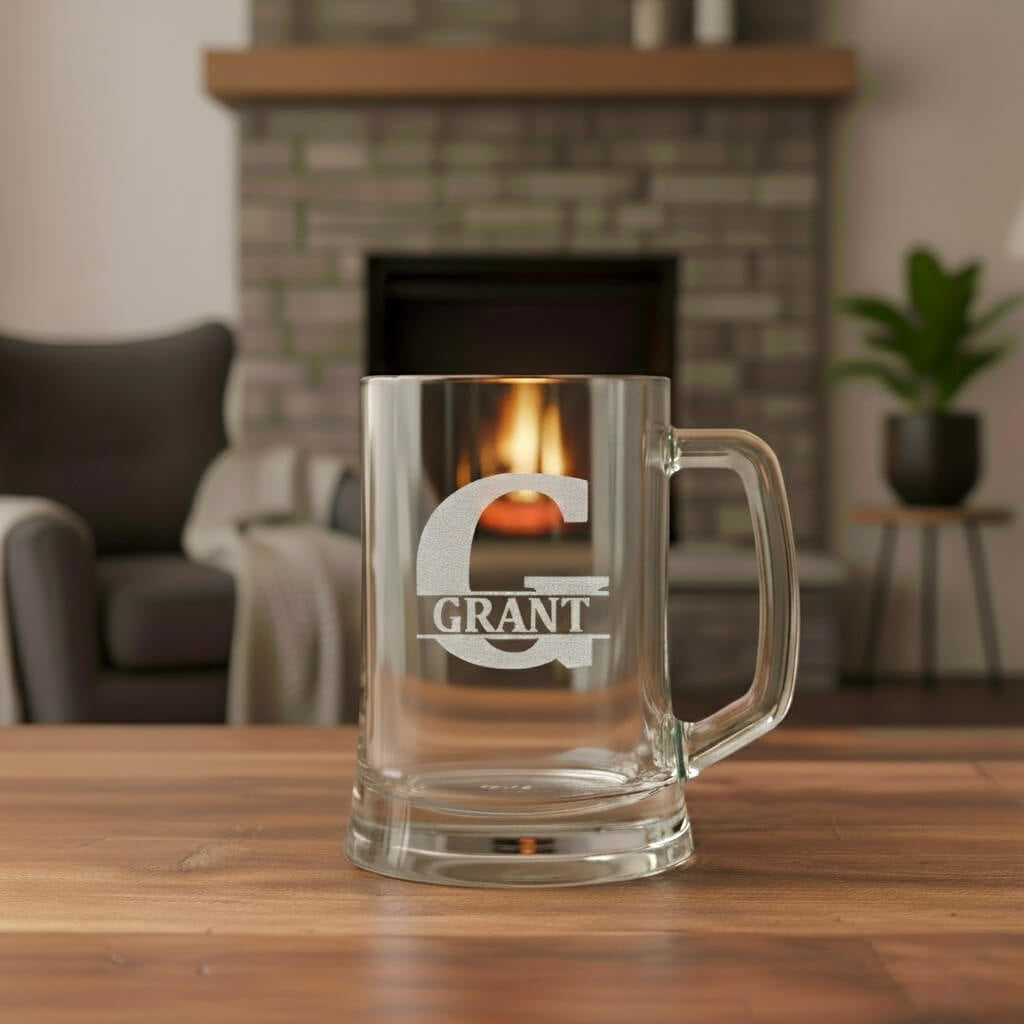 Close-up of personalised beer mug featuring engraved G initial and Grant name, custom glass gift for men