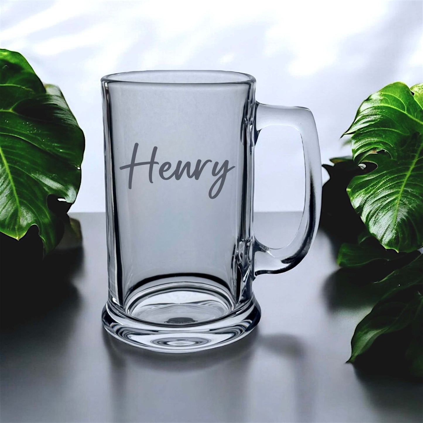 Closeup of precision laser engraving on custom beer glass