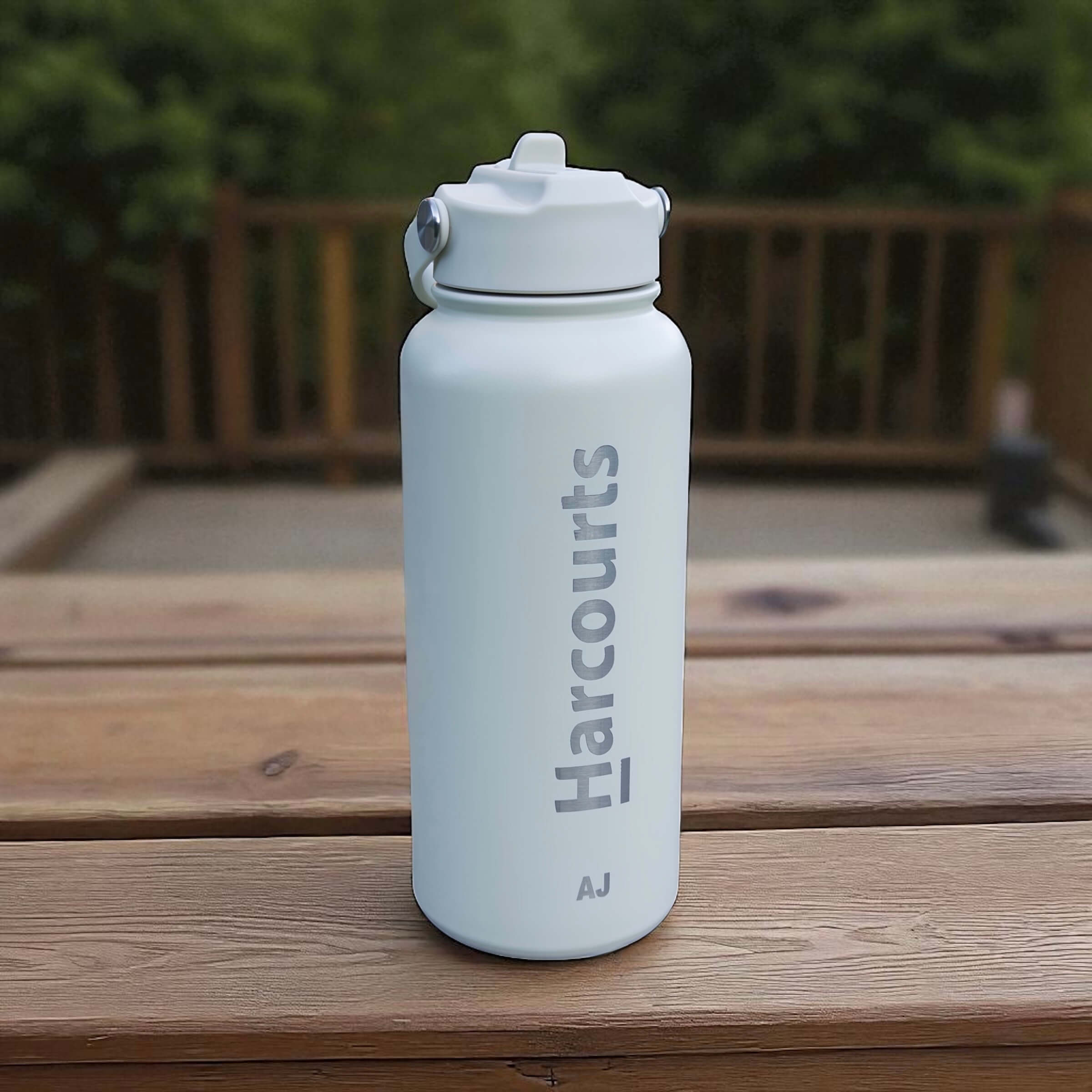 Corporate engraved bottle presented as a staff recognition gift.