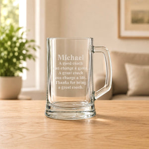 Custom coach gift mug with etched message in a warm home setting