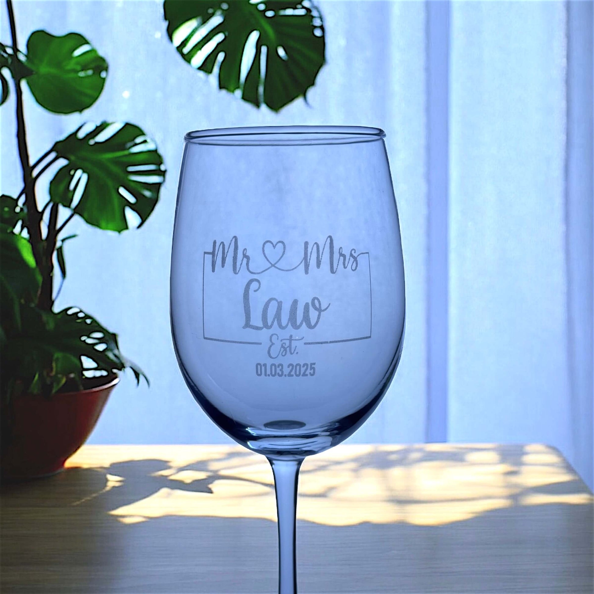 Custom engraved Mr and Mrs wine glass closeup