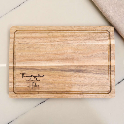 Custom engraved acacia chopping board featuring heartfelt message, personalised kitchen gift for family, mum, or friend who loves cooking.