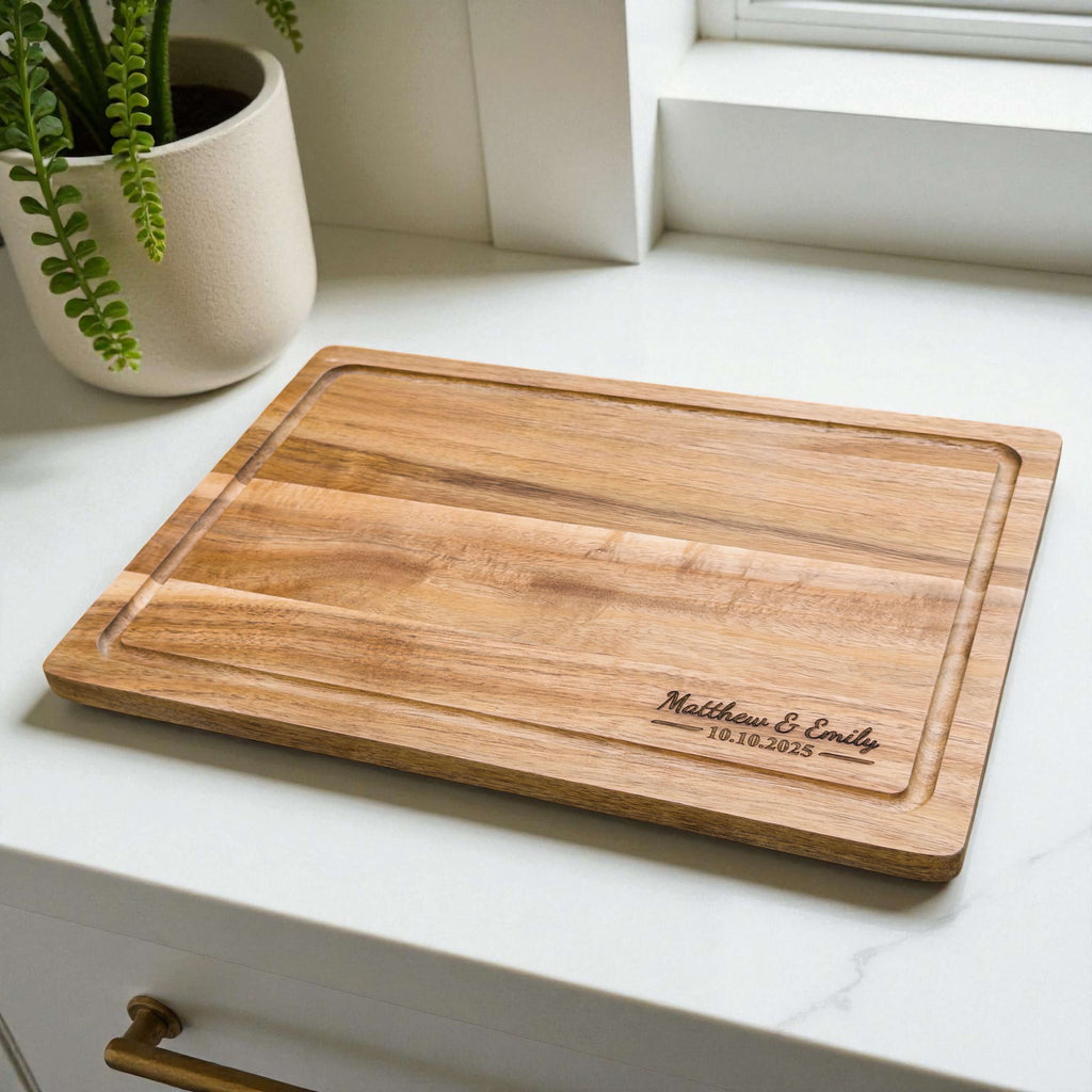 Custom engraved acacia chopping board with couple names Matthew and Emily, perfect wedding or anniversary gift for couples in New Zealand.
