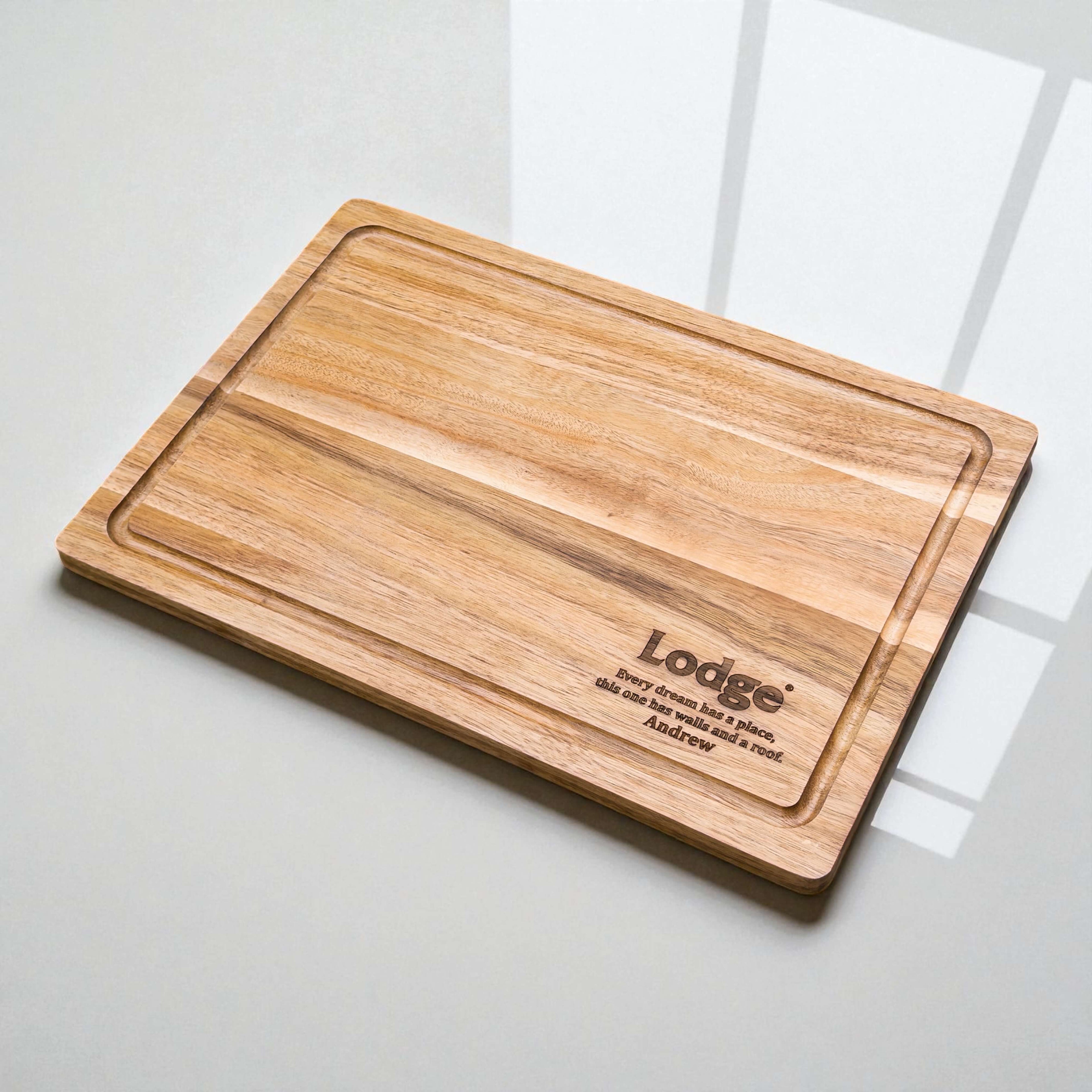 Custom engraved acacia cutting board featuring company branding Lodge, sustainable wooden gift idea for real estate settlements or corporate events.