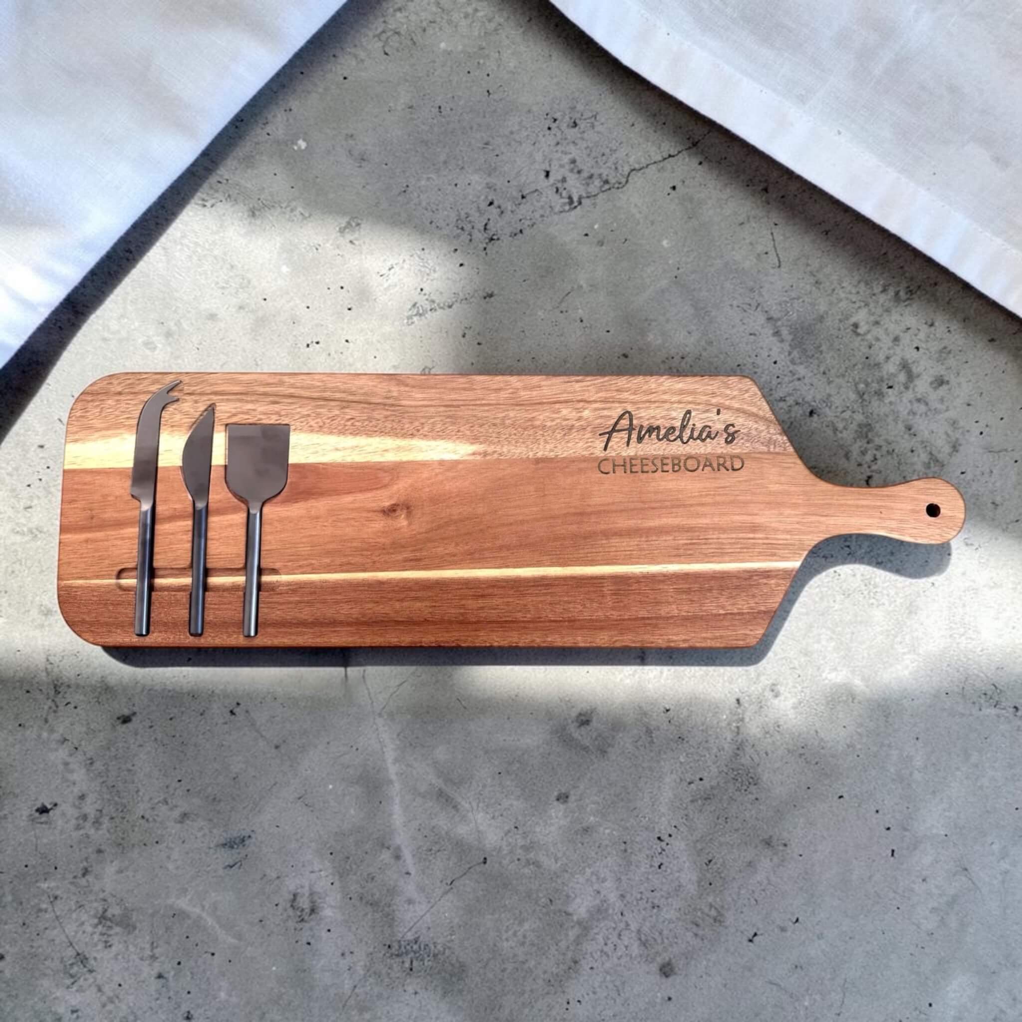 Custom engraved cheeseboard and knife set with personalised name, overhead flat lay, personalised gift NZ