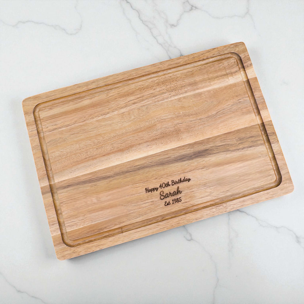 Custom engraved wooden chopping board with birthday message and year established, unique keepsake for 30th, 40th, or 50th birthdays.