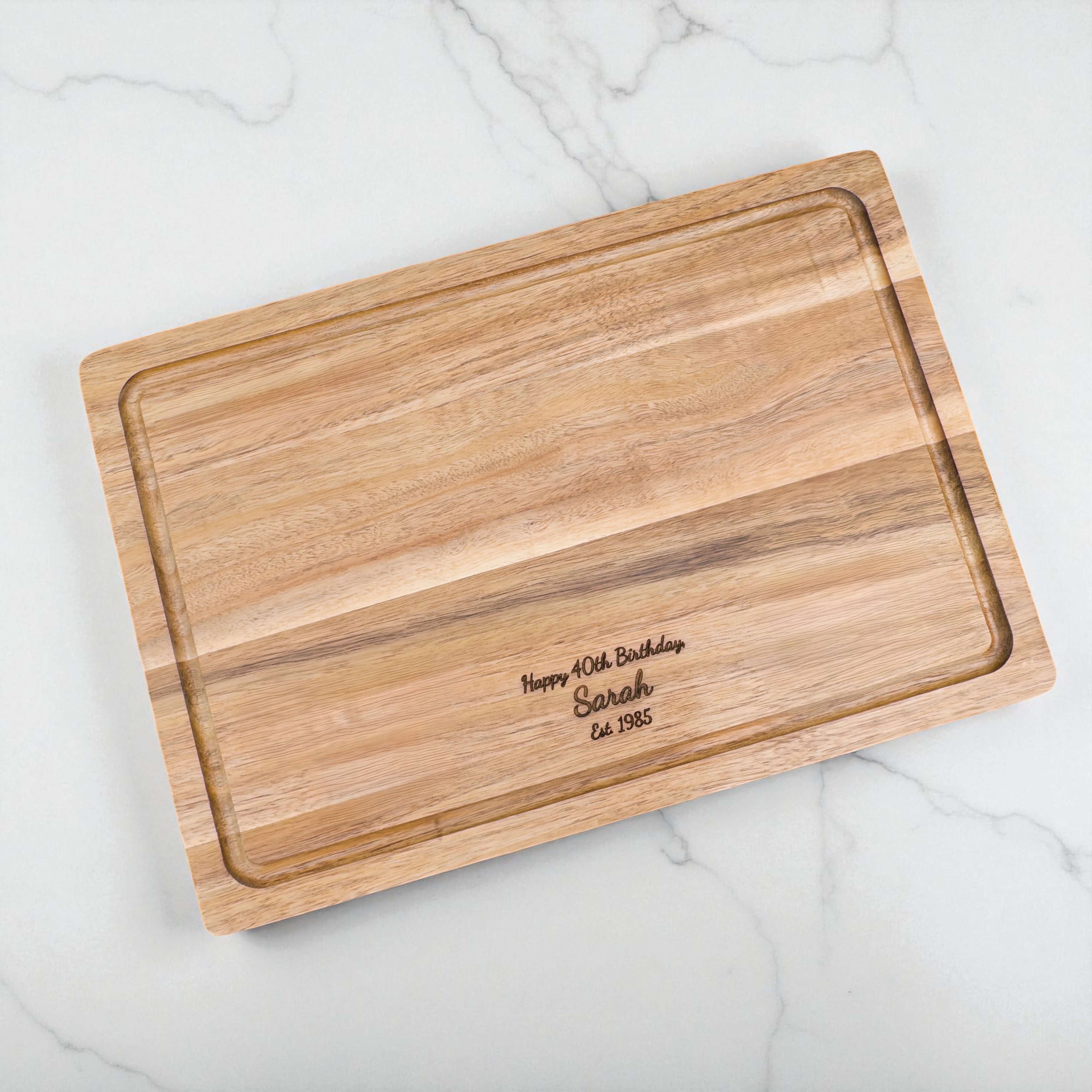 Custom engraved wooden chopping board with birthday message and year established, unique keepsake for 30th, 40th, or 50th birthdays.