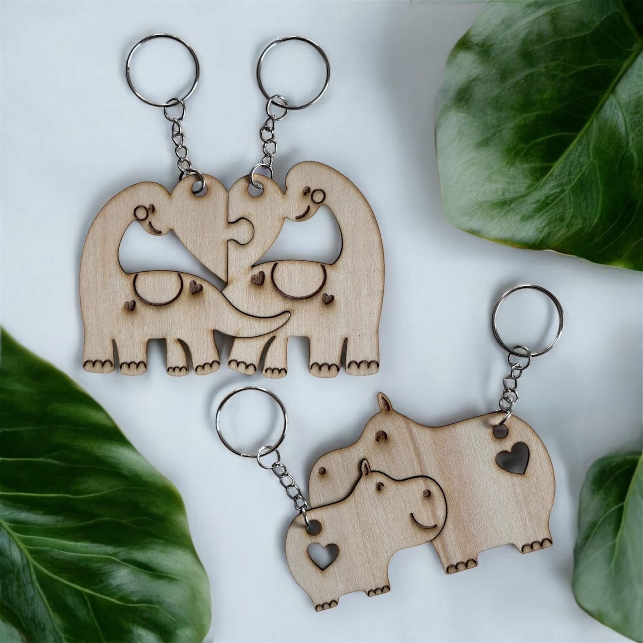 Dinosaur and Hippopotamus wooden key chains engraved