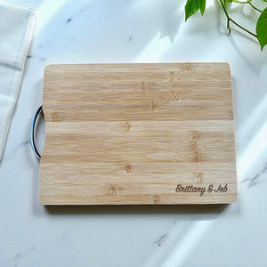 Elegant wedding gift chopping board engraved with couple’s details.