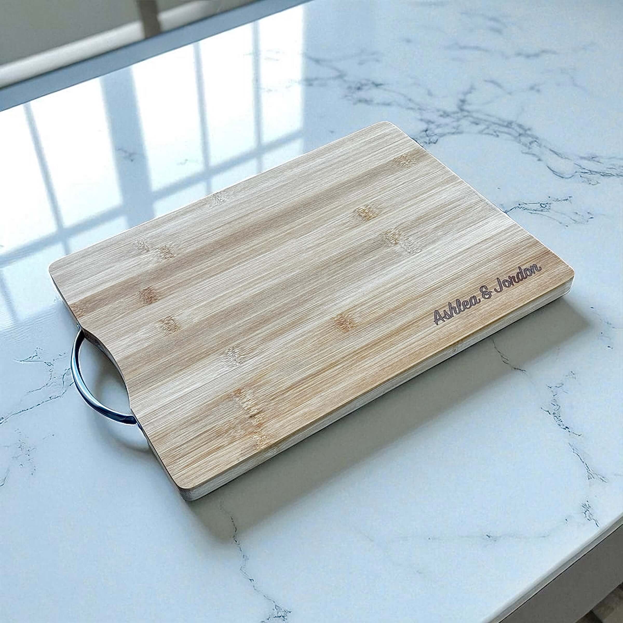 Elegant wedding gift chopping board engraved with couple’s details.