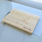 Engraved bamboo chopping board displayed in a modern NZ kitchen as a personalised gift for couples