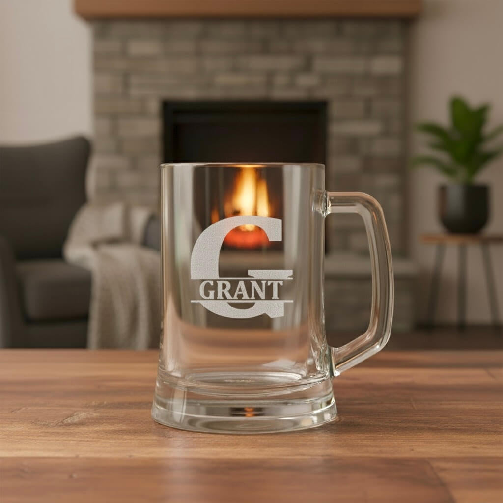Engraved beer handle with bold G initial and Grant name design, premium personalised glass near fireplace