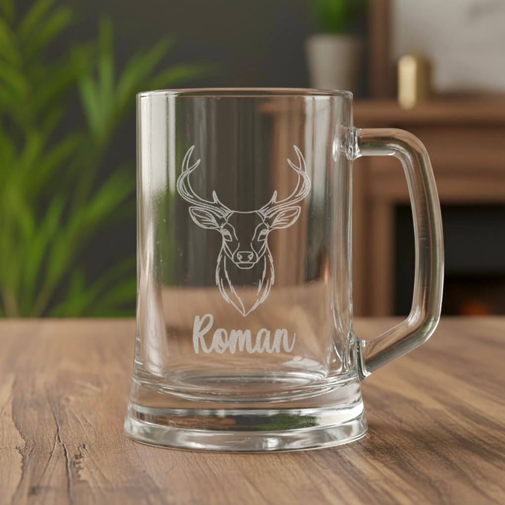 Engraved glass beer handle featuring detailed stag antler design and Roman name engraving, rustic wooden background