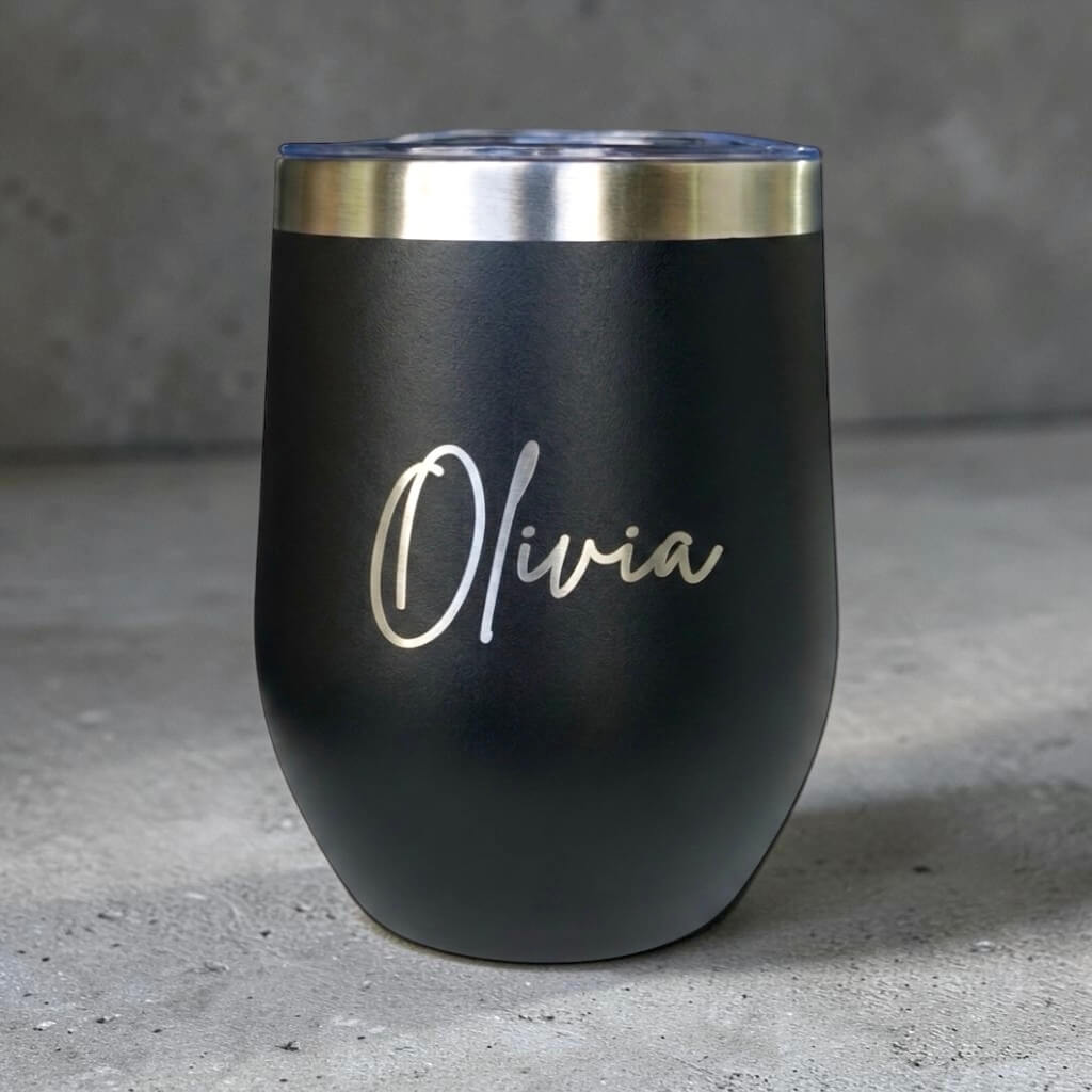 Engraved insulated black coffee cup with Olivia name and clear lid