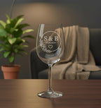 Engraved wedding wine glass with initials S and B and wedding date in floral circle design