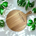 Engraved wooden round serve board