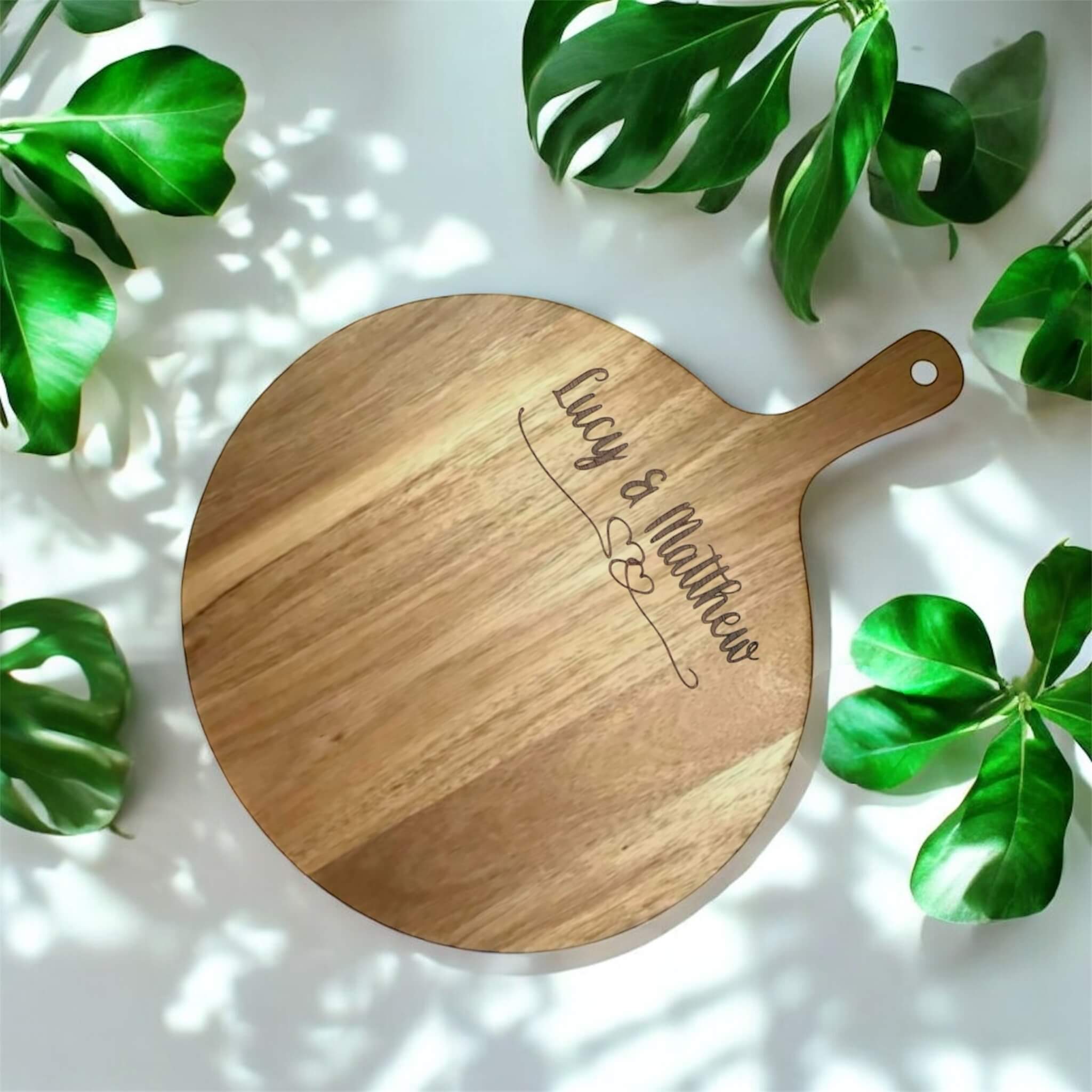 Engraved wooden round serve board
