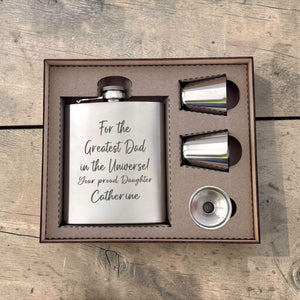 Flask set with engraved message for dad in a wooden box gift set on a wooden surface