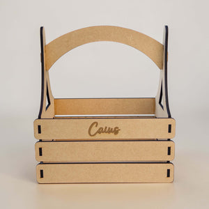 Front view of engraved baby gift basket with name, made for nursery keepsakes