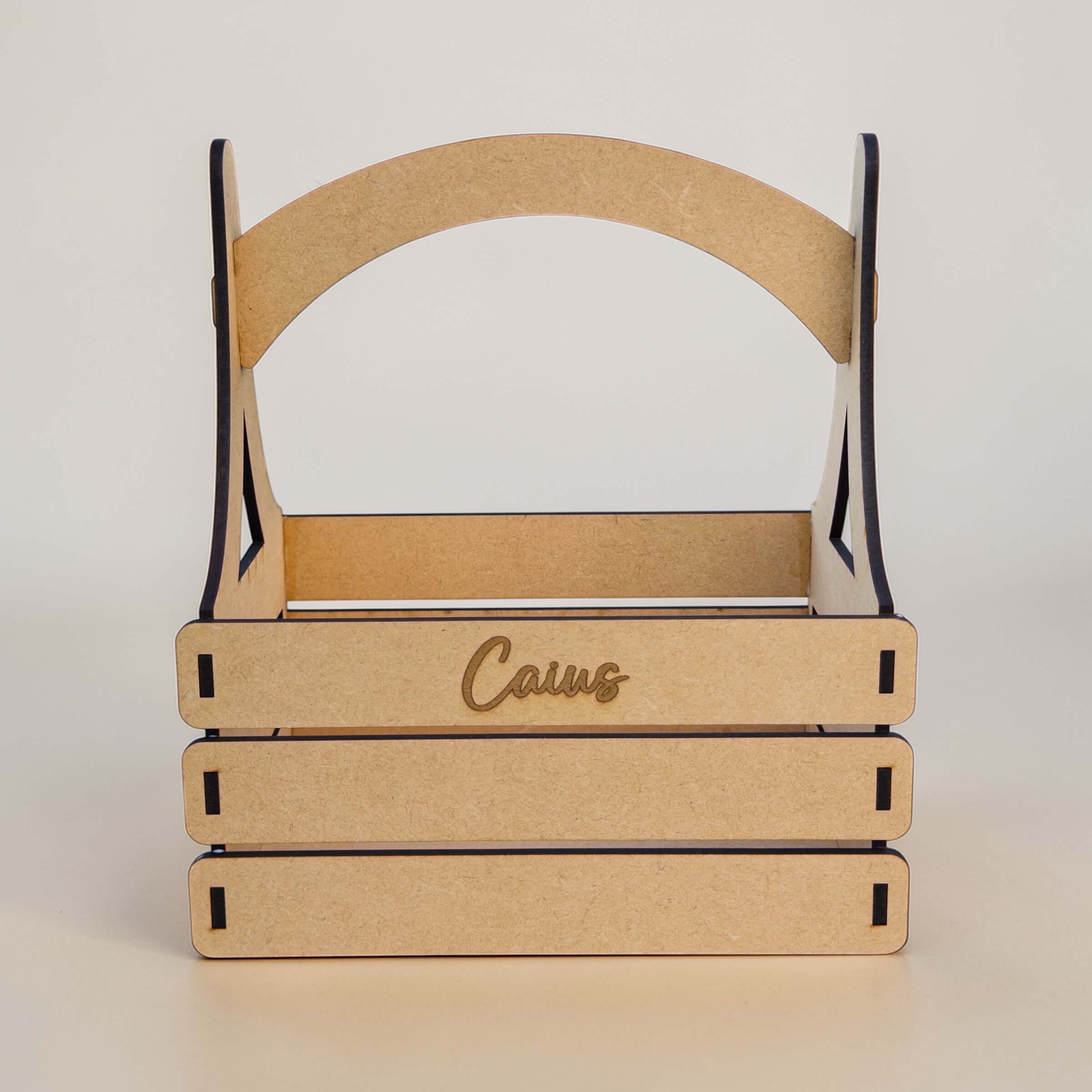 Front view of engraved baby gift basket with name, made for nursery keepsakes