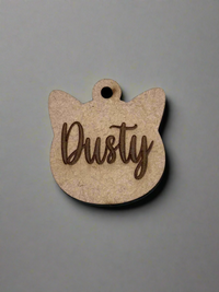 engraved wooden cat id tag in cat face shape with name