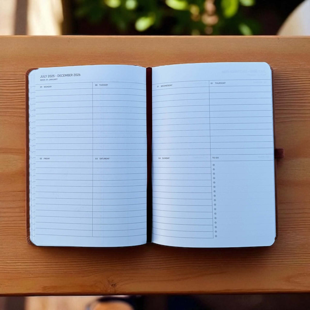 Open A5 weekly planner showing July 2025 to December 2026 week to view pages