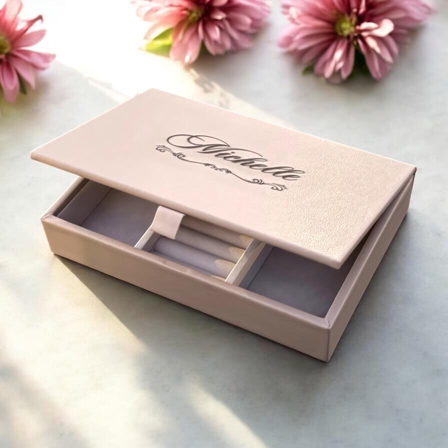 Open view of personalised taupe jewellery organiser showing modular compartments for rings and accessories.