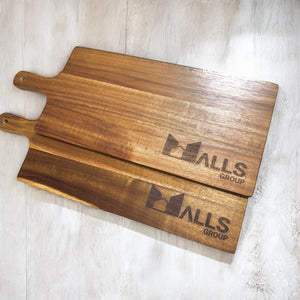 Pair of business-branded serving boards showcasing smooth grain and custom etching