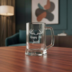 Personalised 21st birthday beer mug engraved “Happy 21st Jacob” with antler design on wooden table in modern room