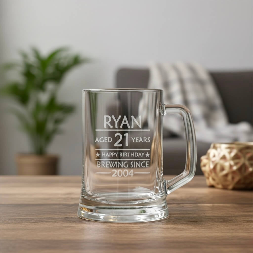 Personalised 21st birthday beer mug engraved with name Ryan, featuring “Aged 21 Years” and “Brewing Since 2004” design