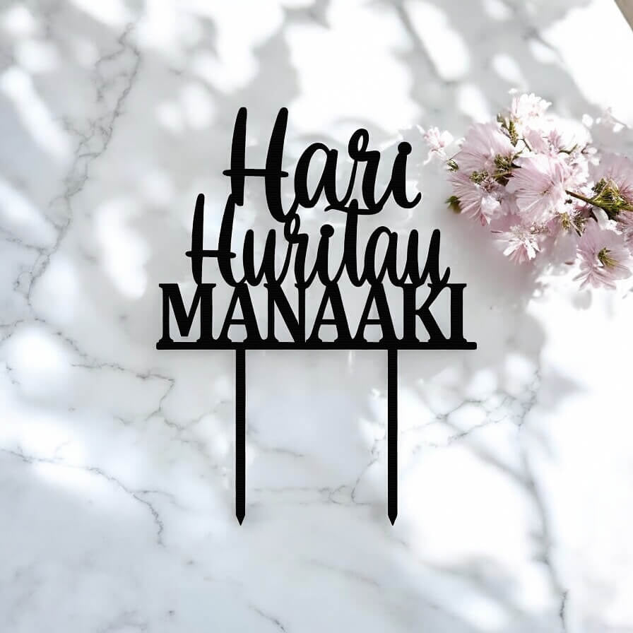 Personalised “Hari Huritau Manaaki” cake topper in black acrylic
