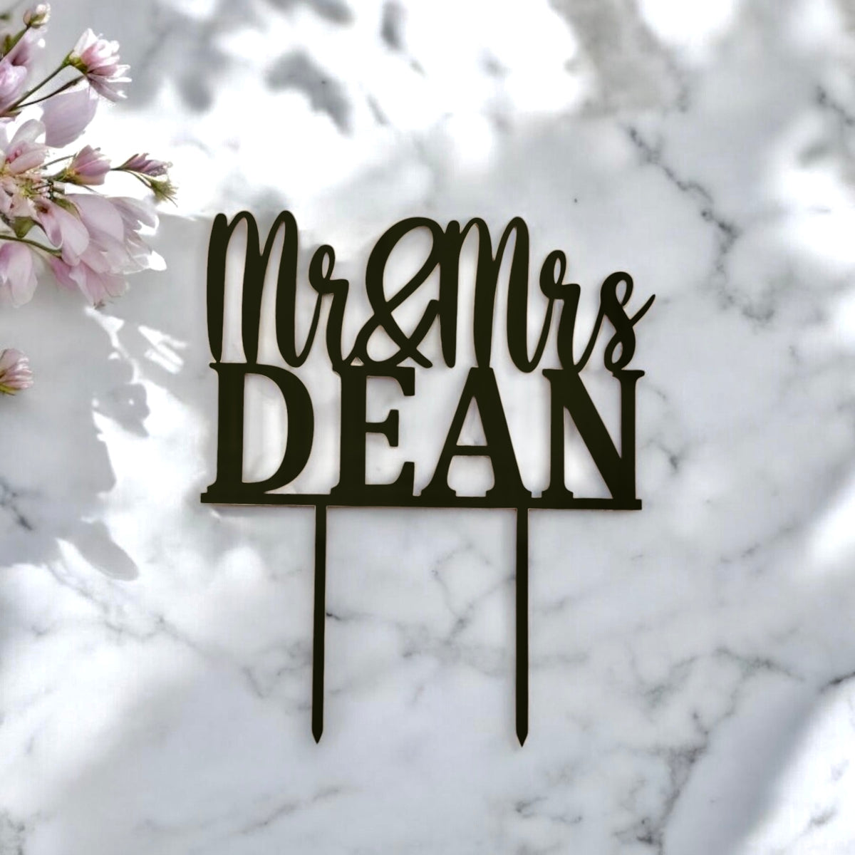 Personalised Mr and Mrs cake topper with custom surname engraving