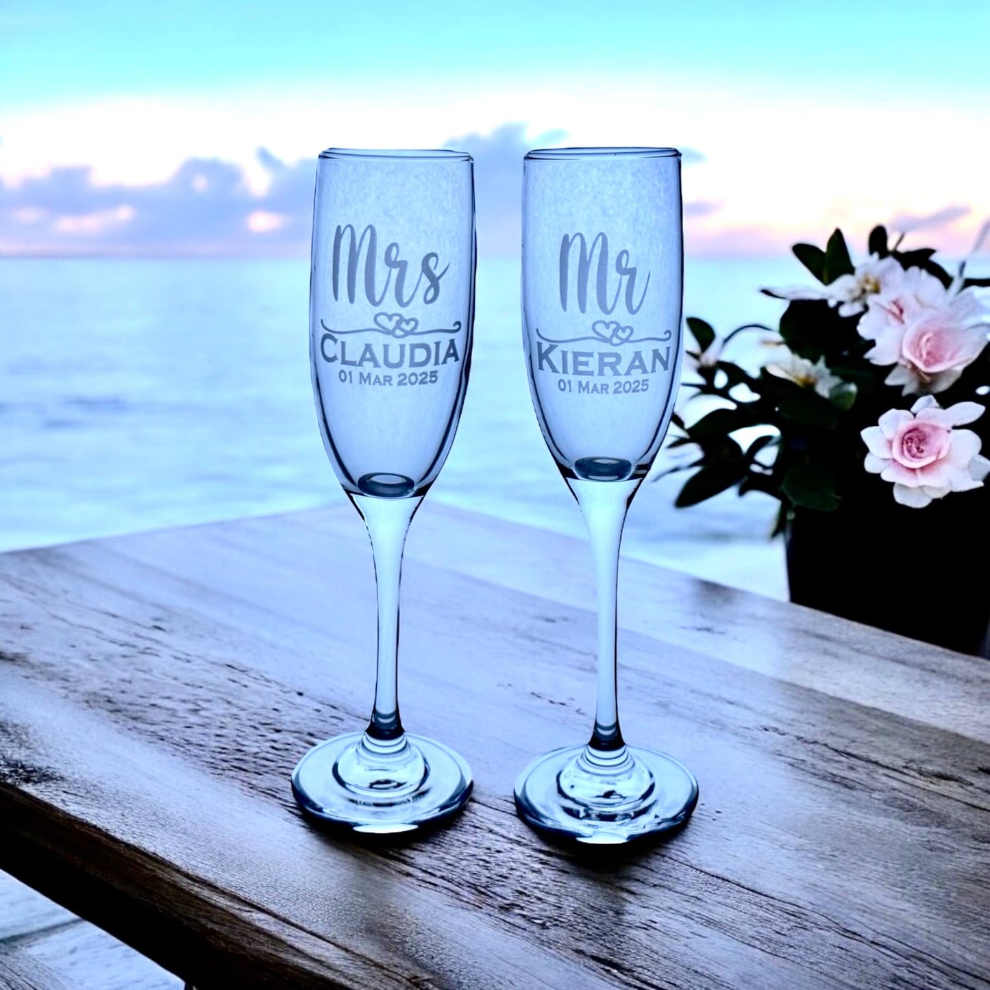 Personalised Mr and Mrs champagne flutes with custom engraving for wedding toast