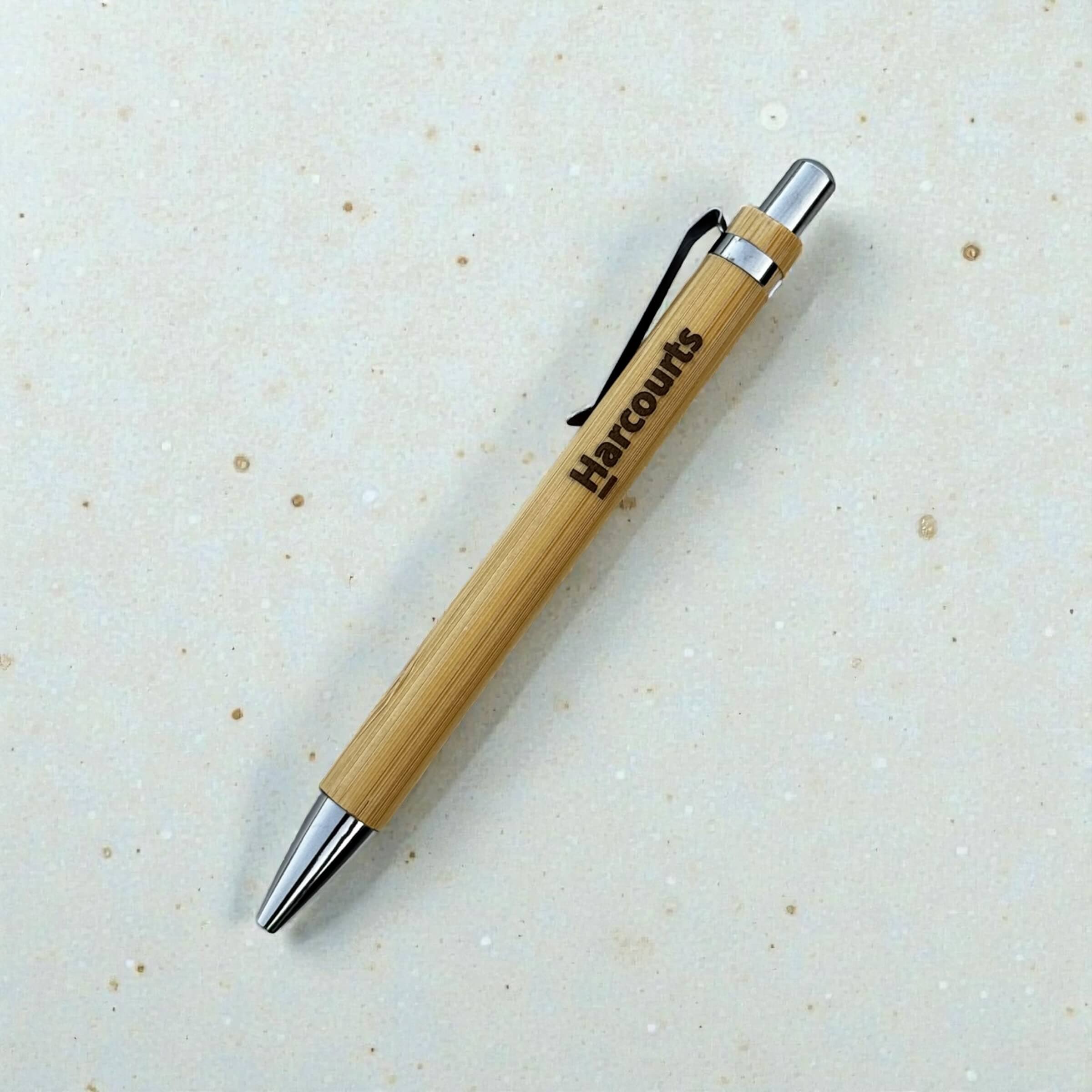 Personalised bamboo ballpoint pen laser engraved with company logo, sustainable branded corporate gift pen
