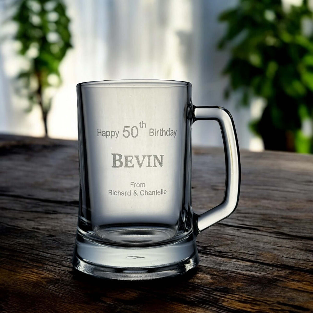 Personalised birthday beer glass displaying gift message “From Richard & Chantelle” beneath the name.