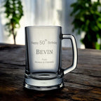 Personalised birthday beer glass displaying gift message “From Richard & Chantelle” beneath the name.
