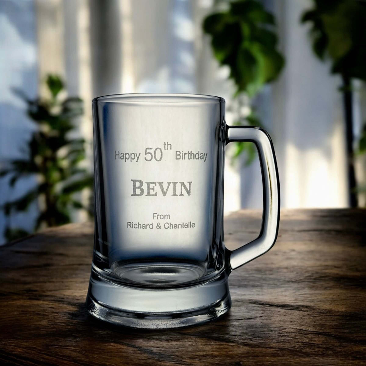 Personalised birthday beer glass with “Happy 50th Birthday Bevin” engraved on clear Pasabahce glass.