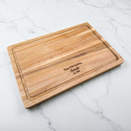Personalised birthday chopping board made from premium acacia wood, engraved with name and birth year, ideal for her or him.