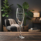 Personalised bridesmaid champagne flute engraved with name Sophie and wedding date.