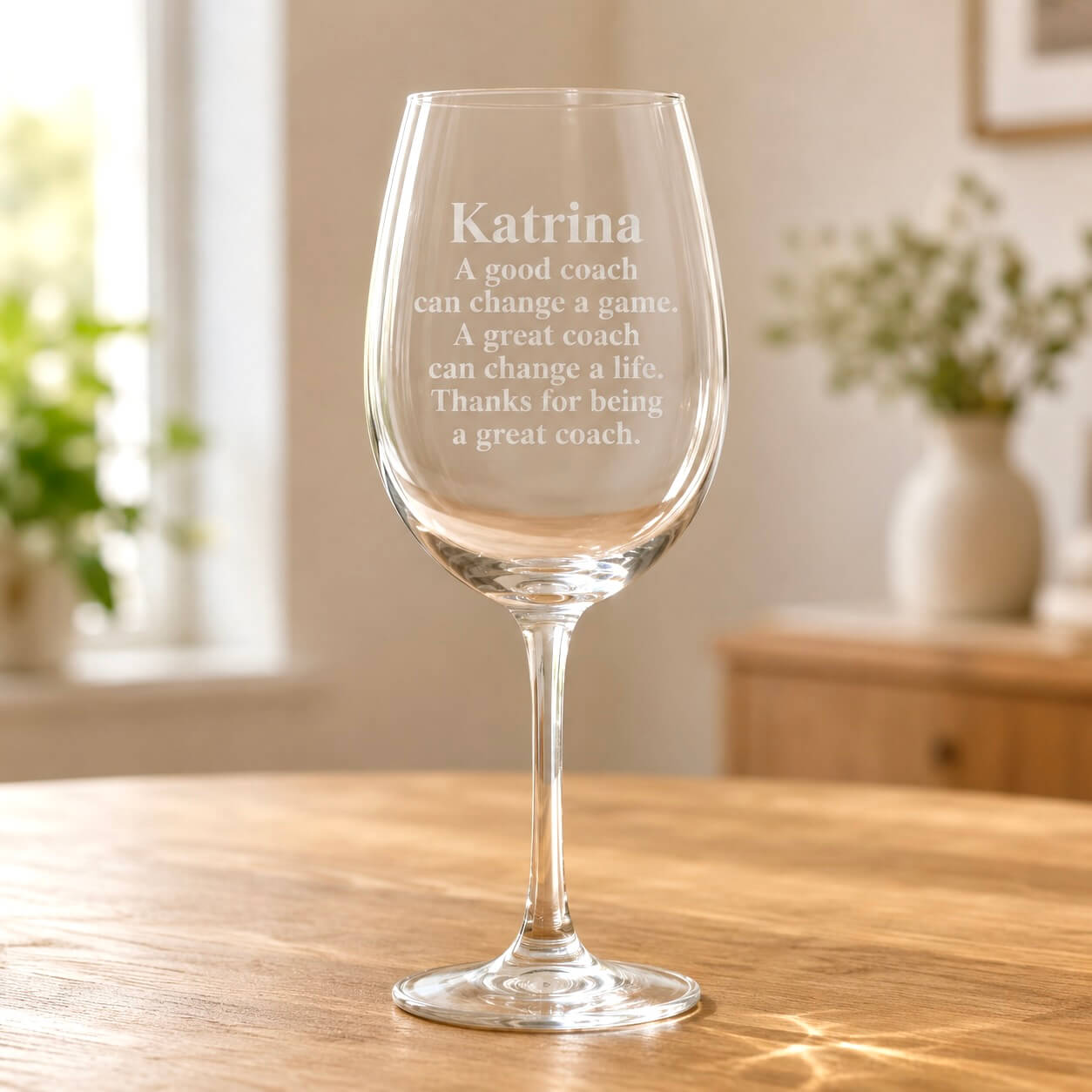 Personalised coach wine glass etched with Katrina and thank you quote