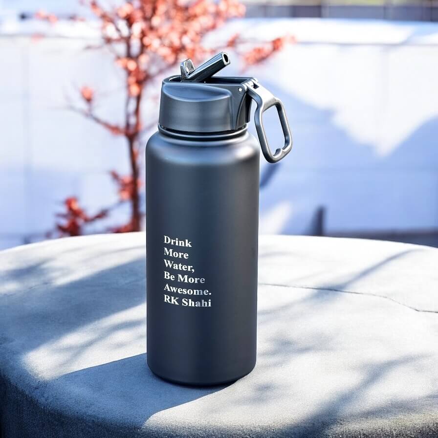 Personalised drink bottle with clean finish, staged on concrete